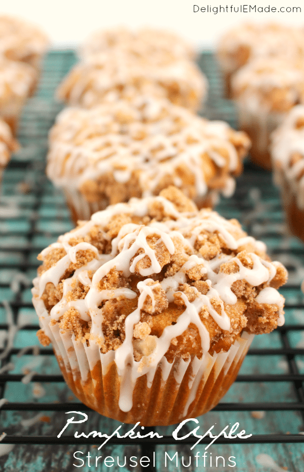 All of your fall favorites in one delicious breakfast treat!  These Pumpkin Apple Struesel Muffins are wonderfully moist, with big chunks of apples baked inside with a delicious streusel and glaze on top.  Bakery quality muffins right at home!