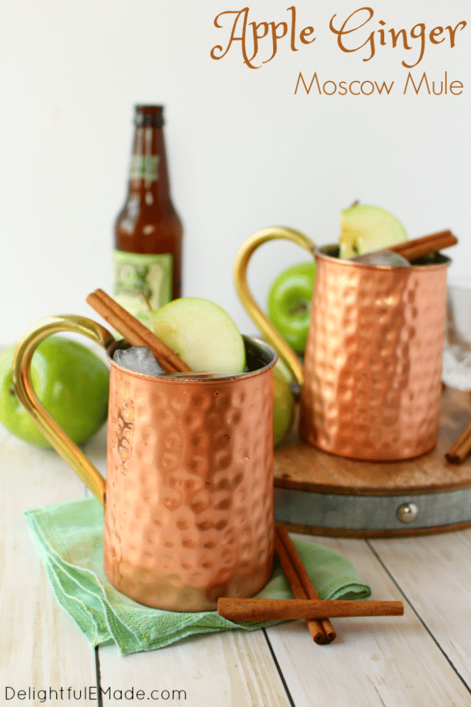 The perfect apple cocktail to enjoy on a crisp autumn day! My Apple Ginger Moscow Mule is made with spiced apple cider, Ginger liqueur, Ginger beer, and topped with a fresh, crisp Granny Smith Apple slice! How 'bout them apples?!