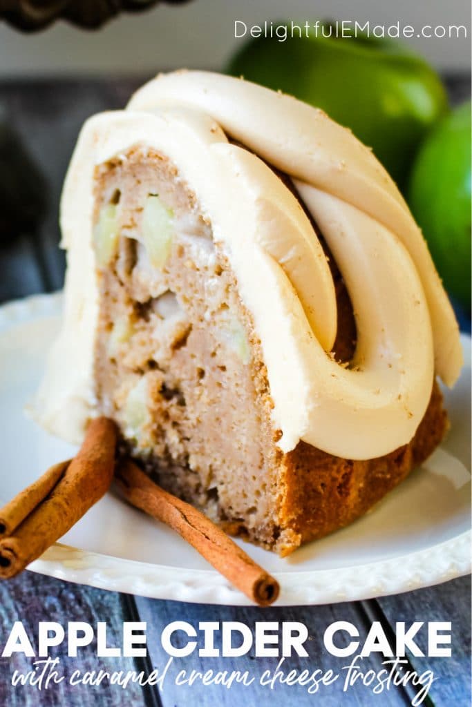 Apple Cider Cake with Caramel Cream Cheese Frosting - a slice of cake on a plate with cinnamon stick garnishes.