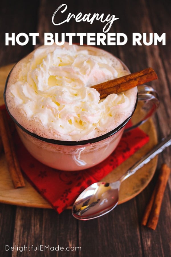 The ultimate hot buttered rum recipe for a cold night! This creamy, hot cocktail is made with spiced rum, cinnamon and ice cream to make it wonderfully decadent and delicious. This Hot Buttered Rum goes perfectly with fuzzy slippers, fireplaces and your favorite Christmas movie!