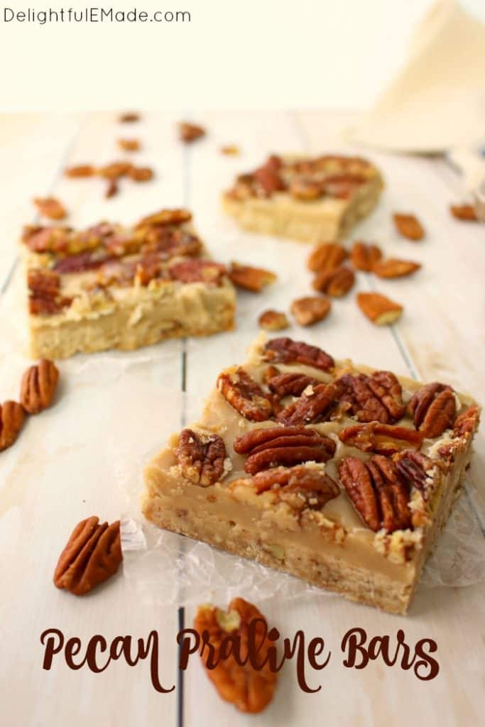 Cross between pecan pie and pecan sandies, these buttery, delicious Pecan Praline Bars are perfect any time you're in the mood for something sweet! An amazing pecan shortbread crust, a delicious caramel filling and topped with brown sugar toasted pecans, these bars are incredible! The perfect addition to your holiday cookie trays!