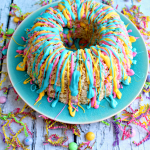 Spring krispie cake drizzled with colorful melting chocolates.