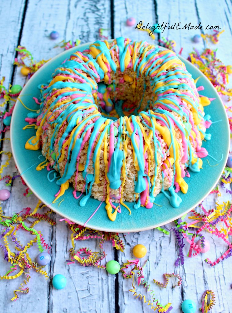 Spring krispie cake drizzled with colorful melting chocolates.