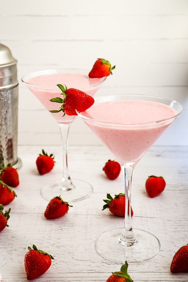 Made with real strawberries, cake vodka and RumChata, this Strawberry Shortcake Martini packs a punch, but is sure to please.  Tasting just like the classic strawberry shortcake dessert, this strawberry cocktail with vodka is amazing!