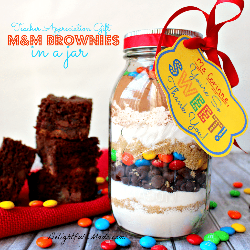 Everyone loves brownies!! Why not give it as a gift? This easy M&M Brownie mix in a jar is the perfect "Thank You" gift for anyone in your life. Makes a great teacher appreciation gift!