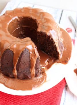 Coca cola bundt cake with a slice removed from the cake.