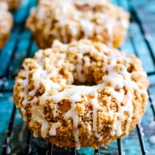 Baked pumpkin spice donuts, topped with streusel and glaze.