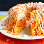 If you like candy corn and rice krispie treats, you'll love this!! Layered to look like candy corn, and drizzled with candy melts, its the perfect fall treat!