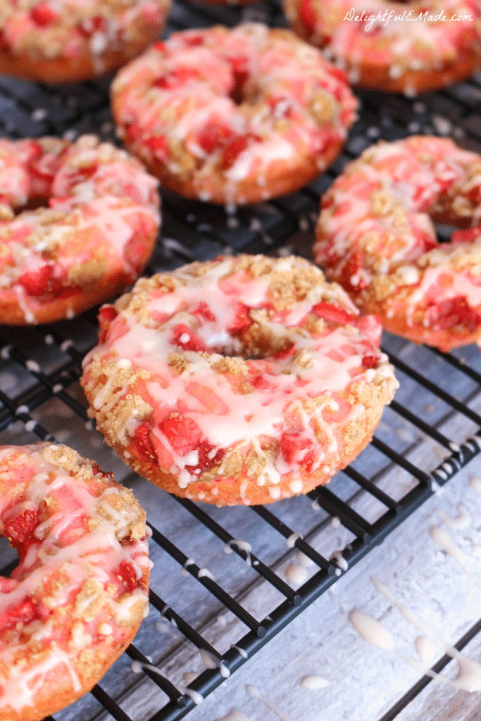  These Strawberry Coffee Cake Donuts are loaded with fresh, chopped strawberries, topped with coffee cake streusel and drizzled with glaze. Breakfast treats have never been more pretty or tasty as these!