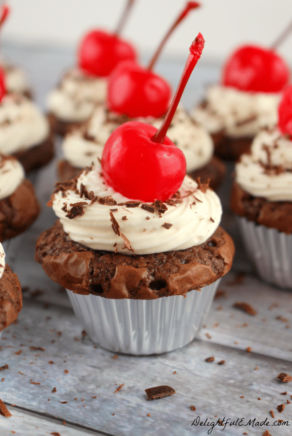 The classic cake turned into a brownie! Fudgy, delicious mini brownies topped with a luscious whipped cream cheese frosting, and a maraschino cherry.