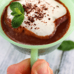 Relax and enjoy a rich, delicious cup of home made Mint Hot Chocolate! It's so easy to make using just a few simple ingredients. You'll never use store-bought powdered cocoa mix after having this!