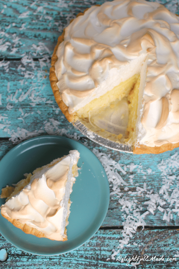The cream pie recipe of your dreams! This classic Coconut Cream Pie is made with a gorgeous meringue and perfectly creamy coconut custard filling.  My mom is famous for this pie for good reason - it's completely incredible!