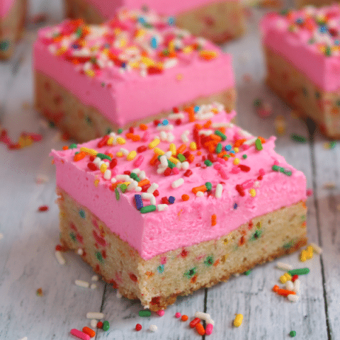 Thick, chewy sugar cookie bars loaded with sprinkles and topped with a thick layer of rich butter cream frosting. So good, you won't be able to eat just one!