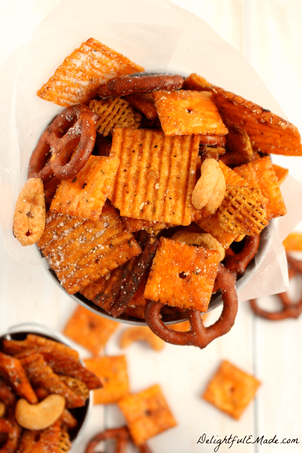 Crunchy, savory and completely irresistible! This crock pot snack mix is made with everyone's favorite Cheez-It crackers, cashews and a Parmesan ranch seasoning, its the perfect snack for any occasion!