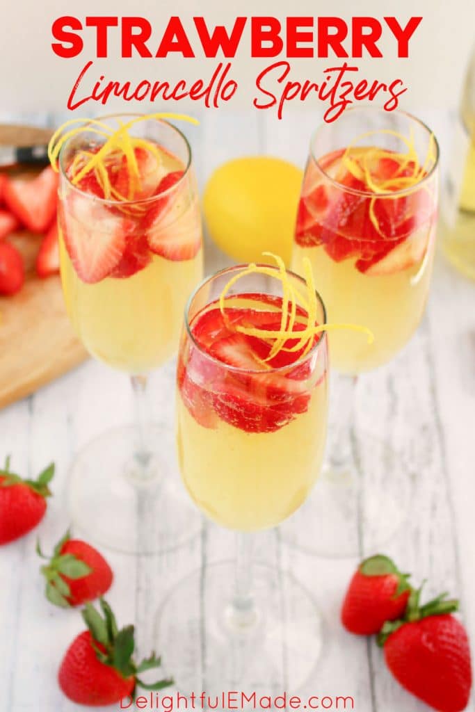 Strawberry limoncello spritzers, limoncello mimosas with sliced strawberries.