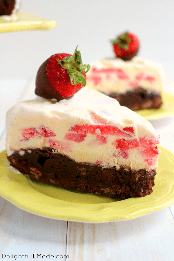 The ultimate summer dessert! Chocolate covered strawberries tops a cool, creamy vanilla ice cream with fresh strawberries and a fudge brownie crust. Drizzled with hot fudge, its a slice of heaven!