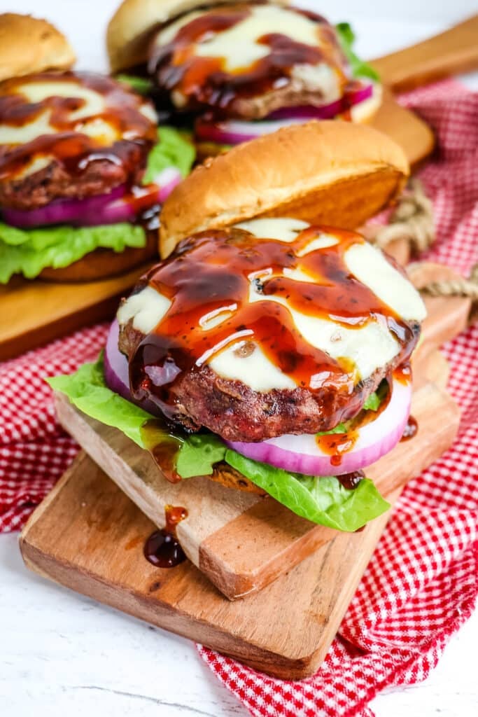 Aloha burger topped with cheese and teriyaki sauce.