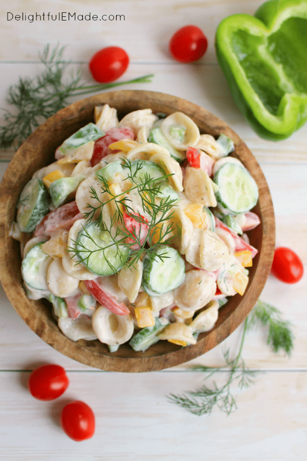 You'll never believe this pasta salad is light and healthy! Made with a delicious Greek yogurt dressing and loaded with fresh garden vegetables, this pasta salad will be your new favorite summer side dish!