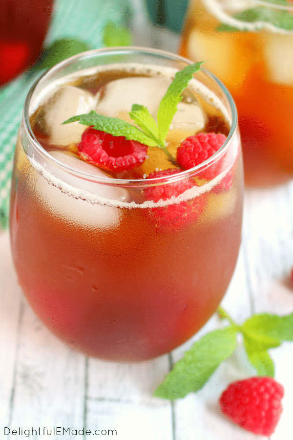 There's nothing better than a cold, refreshing glass of iced tea! Made with fresh mint, raspberries and steeped to perfection, this tea is the perfect drink for sipping on a hot summer day!