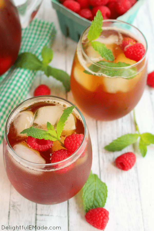 There's nothing better than a cold, refreshing glass of iced tea! Made with fresh mint, raspberries and steeped to perfection, this tea is the perfect drink for sipping on a hot summer day!