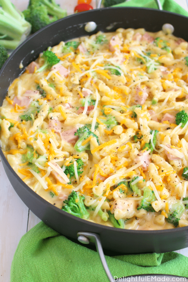 This one-skillet meal has everything you need for a fantastic dinner, including smokey, delicious ham, fresh broccoli, and pasta all in an amazing two cheese sauce! Best of all, this easy pasta dinner is done and on the table in under 30 minutes!