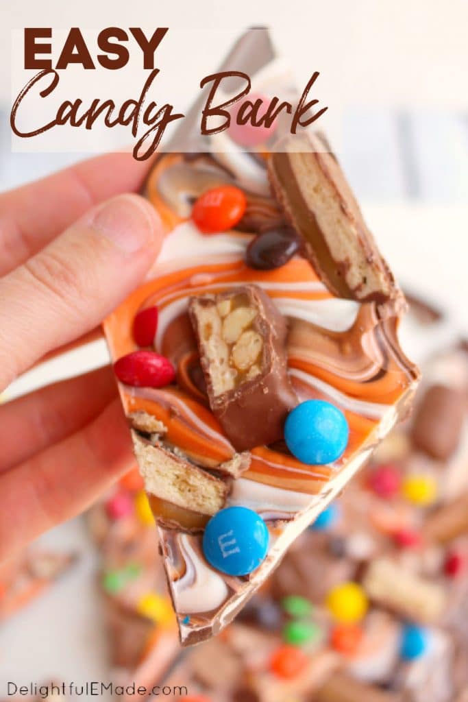 Halloween candy bark, close of photo of the candy bark being held.