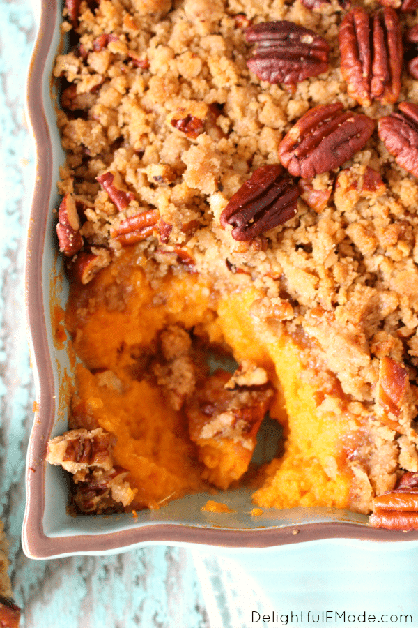 Ruth's Chris restaurants are famous for this amazing Sweet Potato Casserole - now you can make it at home! Creamy, delicious sweet potatoes are topped with a crisp, pecan streusel topping making for an amazing side dish to any holiday meal!