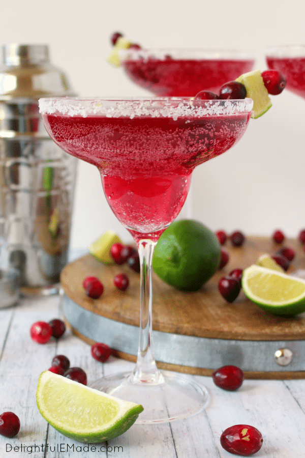 Cranberry and lime flavors come together with tequila for the most amazing holiday cocktail! Perfect for all of your Christmas parties and holiday gatherings, this easy, delicious drink is perfect for enjoying under the mistletoe!
