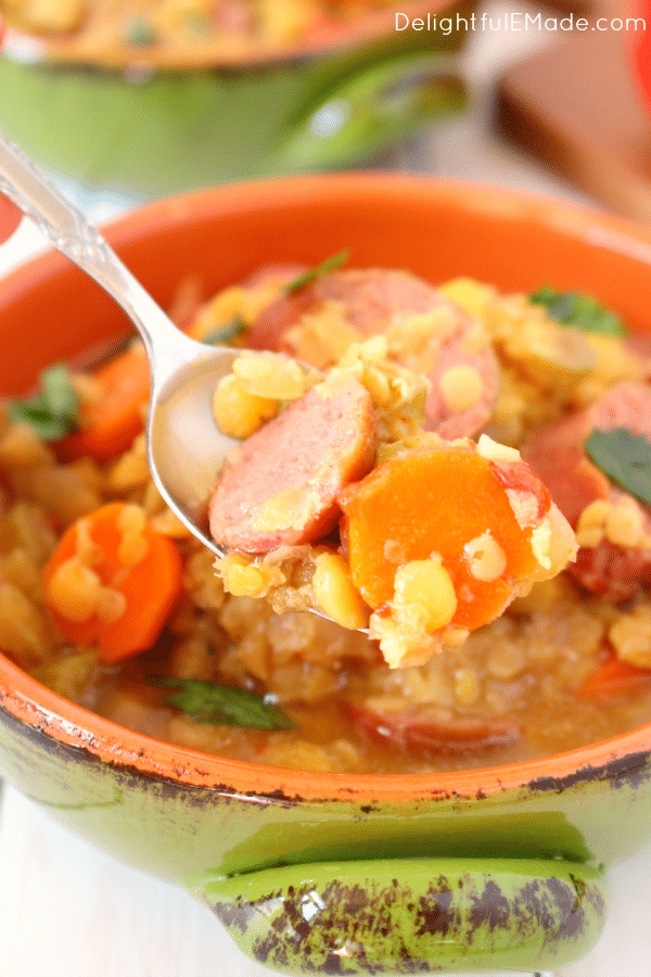 Fire up your slow cooker or crock pot - it's time for some amazing soup! My Sausage and Lentil Soup is the perfect way to warm up after a cold day. Loaded with lentils, vegetables and delicious, savory sausage, this soup will hit the spot!