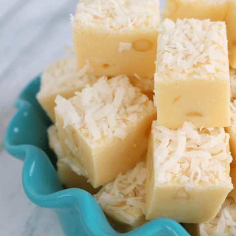 If you're a coconut lover, this fudge is for you! White chocolate, coconut and macadamia nuts make for the most amazing sweet, rich candy treat! Perfect for the holidays or anytime you're in the mood for some tropical flavors!