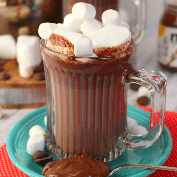 If you love Nutella, this homemade hot chocolate is for you! Made on the stove top in just minutes, this creamy, chocolaty hot drink is perfect for warming up when its cold outside! 