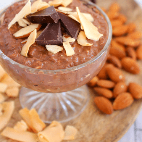 Chocolate, coconut, and almonds come together to make these overnight oats the perfect breakfast. Loaded with protein and fiber this breakfast is also healthy, too! Oatmeal has never tasted so good!