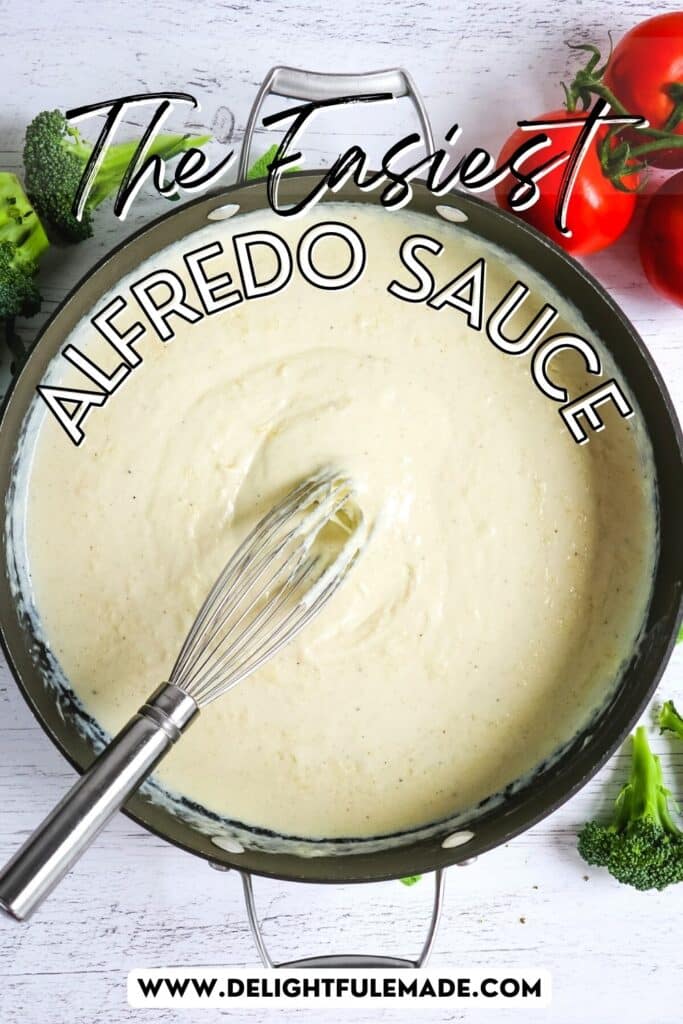 Homemade alfredo sauce recipe in a skillet with a whisk in the center of the sauce.