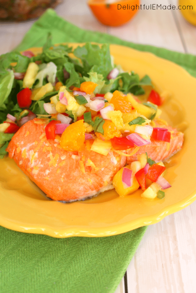 The most flavorful, delicious Salmon you'll ever have! This healthy, easy dinner comes together in minutes and is topped with my fresh, delicious Pineapple Mango Salsa! Perfect any day of the week!