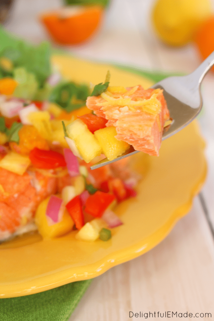The most flavorful, delicious Salmon you'll ever have! This healthy, easy dinner comes together in minutes and is topped with my fresh, delicious Pineapple Mango Salsa! Perfect any day of the week!