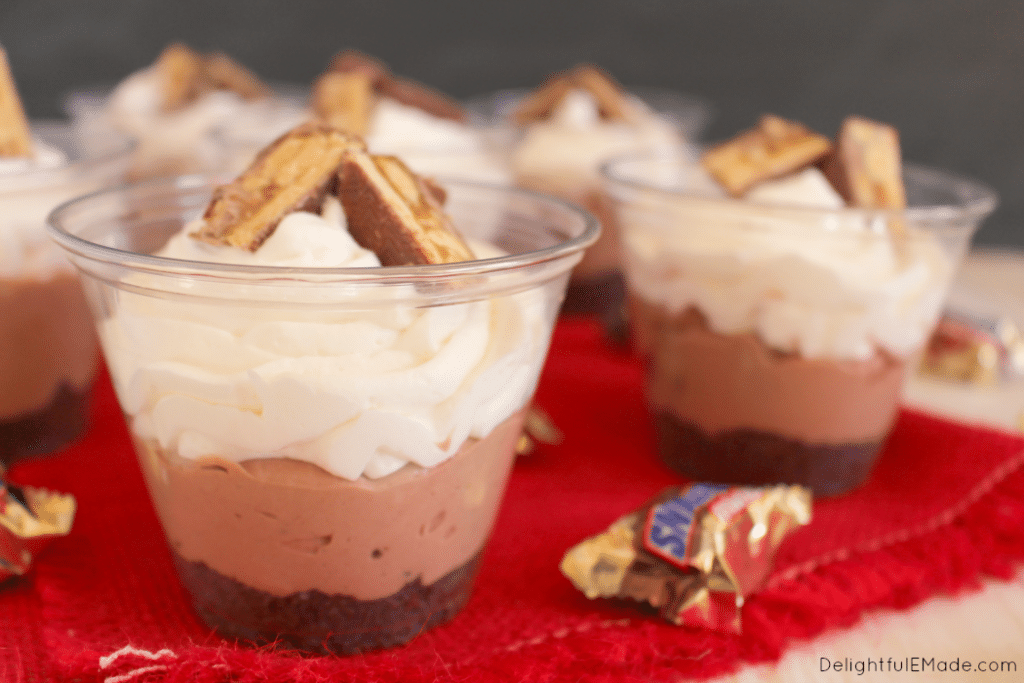 Everything you love in the classic SNICKERS® candy bar made into a delicious no-bake dessert! These easy cheesecake cups are perfect for parties, especially home-gating, tailgating and perfect for watching the big game!