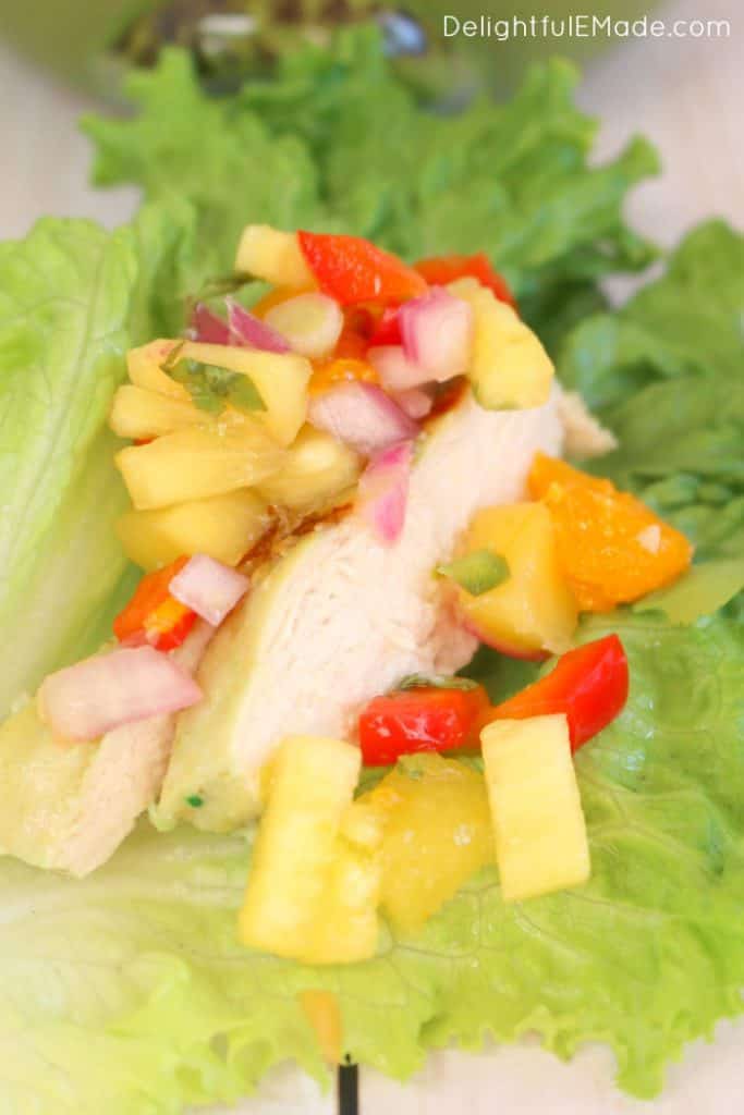 Do you pack your lunch for work? Bring these amazingly healthy, delicious Spicy Chicken Lettuce Wraps! The flavorful Pineapple Mango Salsa along with the Spicy Verde Grilled Chicken make for a tasty, healthy, and filling meal! Low carb, Paleo friendly, gluten free and only 5 Weight Watchers Smart Points!