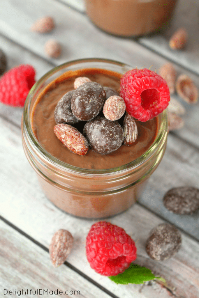Raspberries, almonds and chocolate come together for the most amazing sweet treat! Sweet, creamy chocolate pudding is topped with DOVE® Dark Chocolate Raspberry & Honey Roasted Almonds, making an incredible treat for any chocolate and raspberry lover!