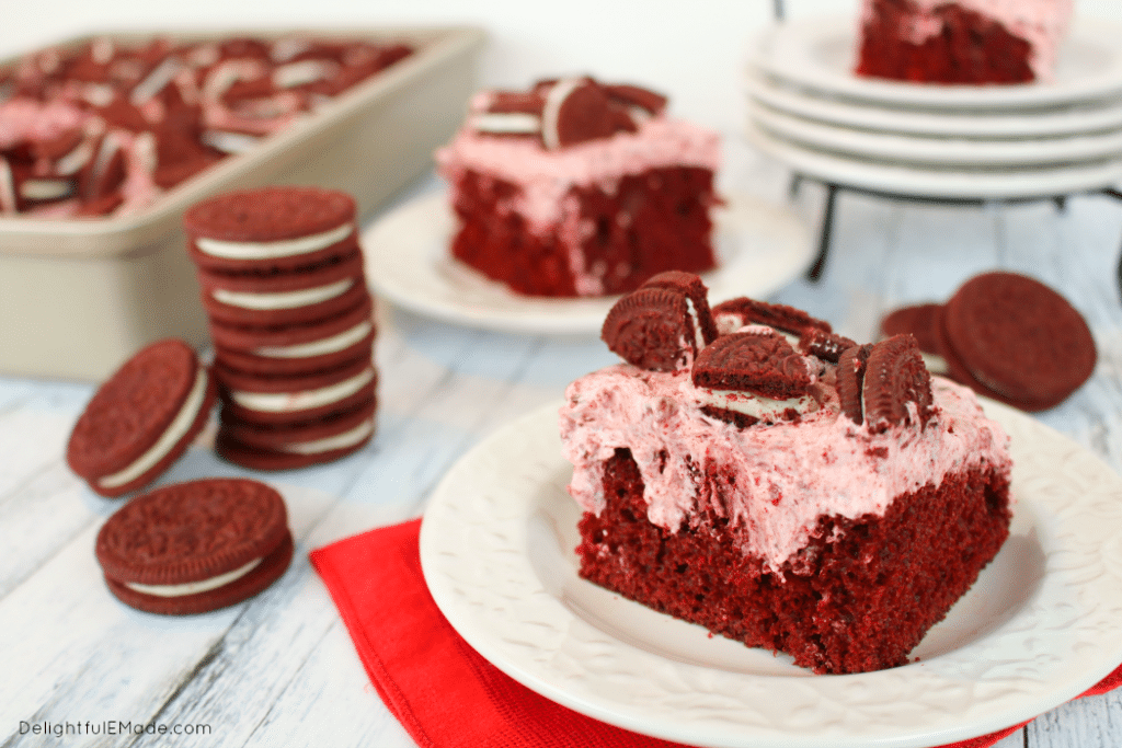 A red velvet cake lovers dream! Red velvet cake topped with a delicious cream cheese filling and loaded with Red Velvet OREO's. The ultimate dessert perfect for any occasion!