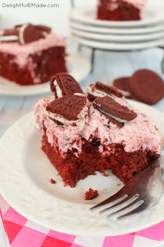 A red velvet cake lovers dream! Red velvet cake topped with a delicious cream cheese filling and loaded with Red Velvet OREO's. The ultimate dessert perfect for any occasion!