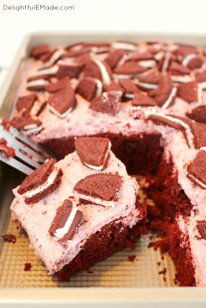 A red velvet cake lovers dream! Red velvet cake topped with a delicious cream cheese filling and loaded with Red Velvet OREO's. The ultimate dessert perfect for any occasion!