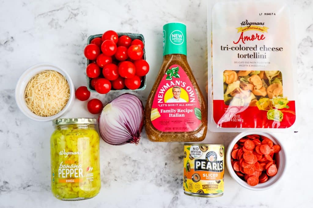 Ingredients needed to make Italian tortellini pasta salad.
