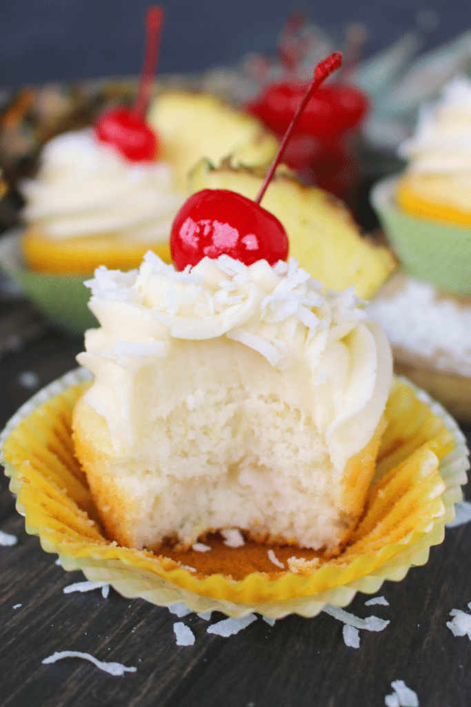 The classic Pina Colada cocktail turned into a cupcake! Pineapple and coconut baked into a moist, delicious cake and then topped with an amazing coconut cream cheese frosting. The perfect to celebrate any occasion!