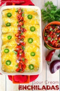 The only enchilada recipe you'll ever need!  Stuffed with seasoned ground beef and cheese, smothered with a delicious sour cream sauce, topped with more cheese and baked to perfection. These Sour Cream Enchiladas are incredible!