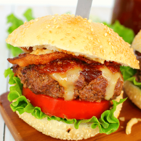 Fire up the grill, it's time for some amazing burgers! My Smokehouse BBQ burgers are topped with smoked Gouda, bacon, fried onions, and an amazing Smokey Chipotle Barbecue Sauce. Juicy and super flavorful, you'll be making these burgers all summer long!