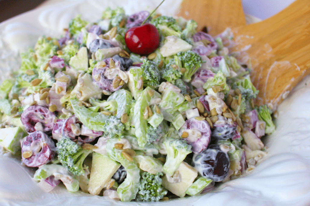 This Healthy & Easy Broccoli Salad recipe is a fantastic side dish, loaded with amazing flavor and crunch!  Fresh cherries, apples and a simple Greek yogurt dressing make this the best broccoli salad recipe that can be enjoyed any time of year!