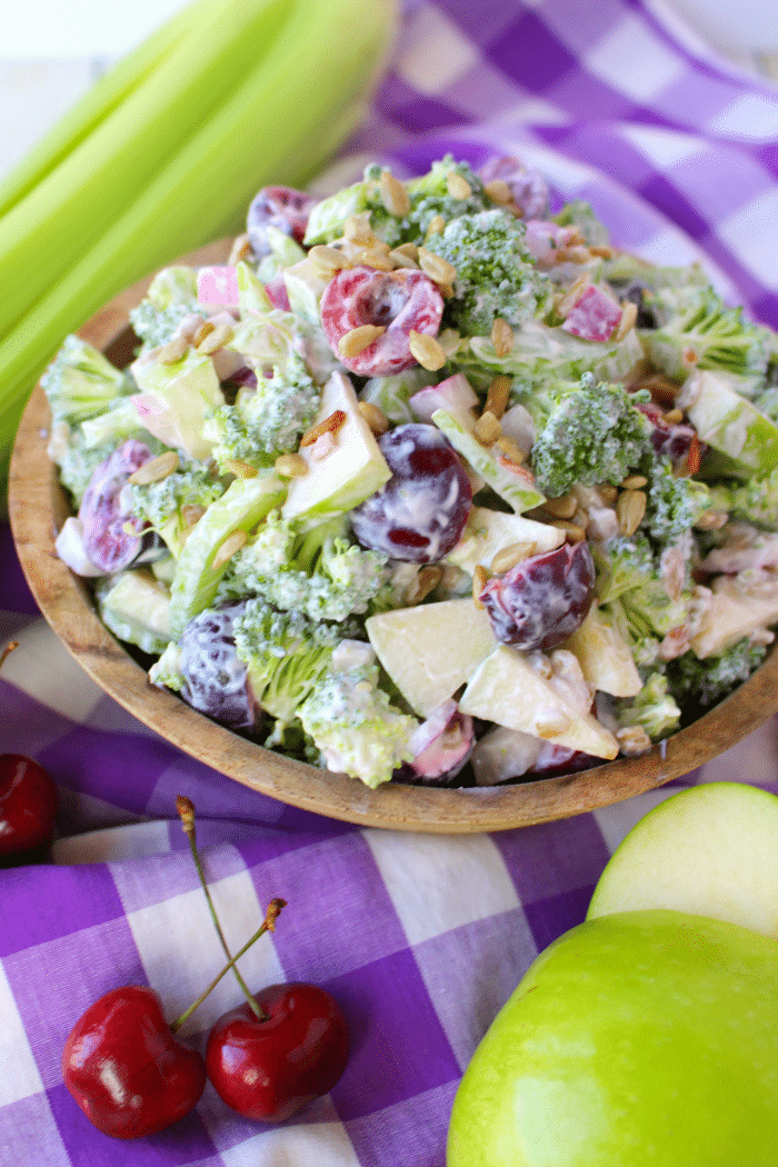 This fantastic Broccoli Salad is the perfect side dish, loaded with amazing flavor and crunch! Fresh cherries, apples, celery, red onion, and sunflower seeds, along with the broccoli and a simple creamy dressing make this a great summer salad that can be enjoyed any time of year!