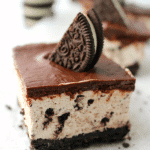 The ultimate dessert for anyone that loves OREO cookies! A thick OREO crust, creamy OREO no-bake cheesecake filling, and topped with a delicious layer of chocolate. This easy, no-bake dessert is perfect for just about any occasion!
