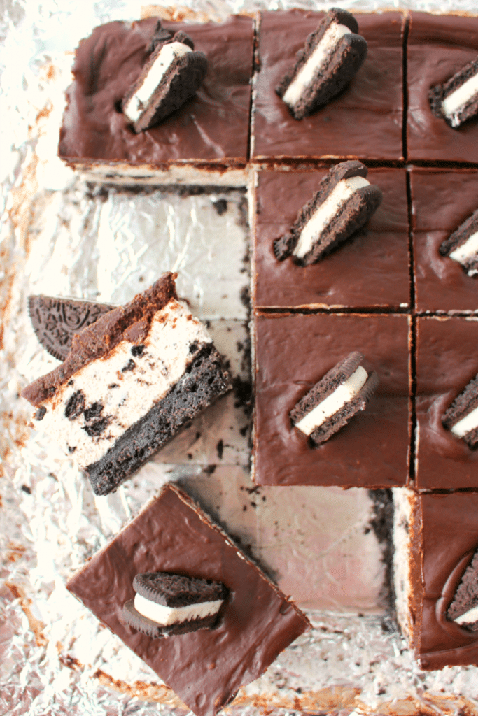 The ultimate dessert for anyone that loves OREO cookies! A thick OREO crust, creamy OREO no-bake cheesecake filling, and topped with a delicious layer of chocolate. This easy, no-bake dessert is perfect for just about any occasion!