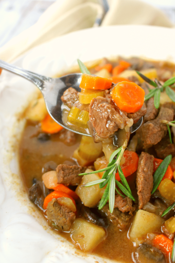 This easy slow cooker beef stew recipe is a delicious dinner option for any night of the week. Made with tender, delicious sirloin, along with big chunks of carrots, celery, potatoes and mushrooms its the ultimate comfort food!